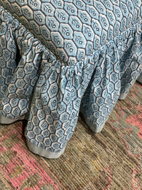 Skirted Ottoman with Tufting